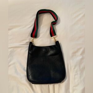 Black faux Leather Crossbody Bag with Striped Green-Red Strap